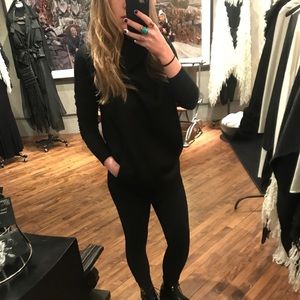 Black neoprene sleeveless top with draping